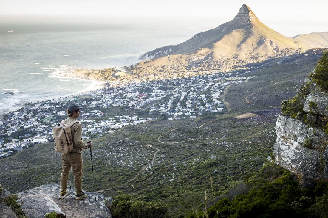 A hiker on a ridge above Cape Town